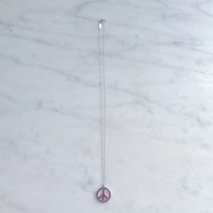 Tiffany peace sign necklace.  Worn less than 5 times.  Just shined at Jeweler.